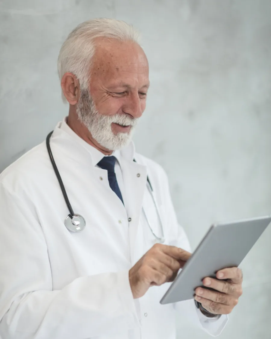 A TF Pharma pharmacist reviewing a prescription